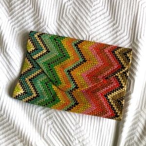 Super cute, multi-colored clutch.